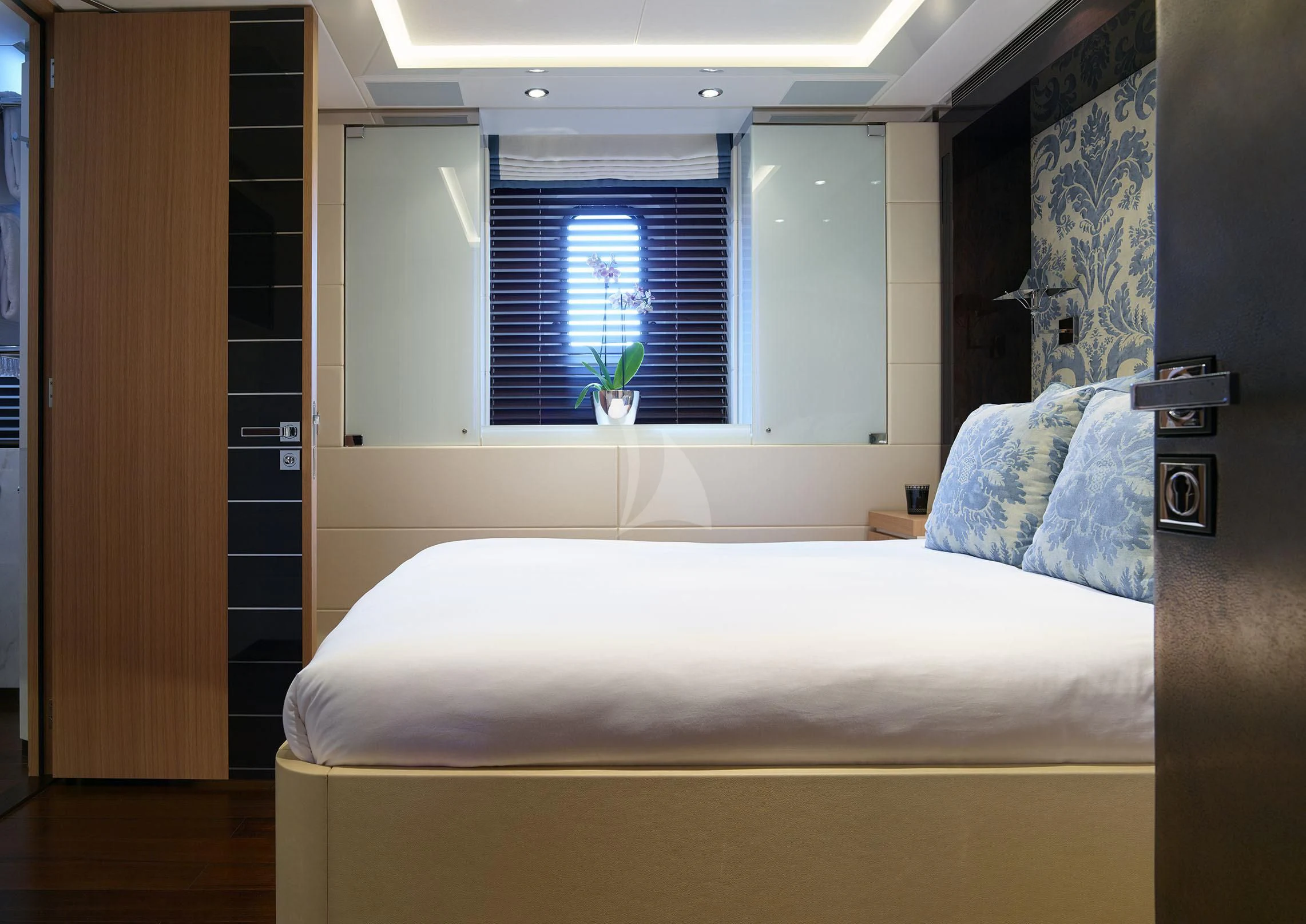 a bed in a room aboard ROCKET Yacht for Sale