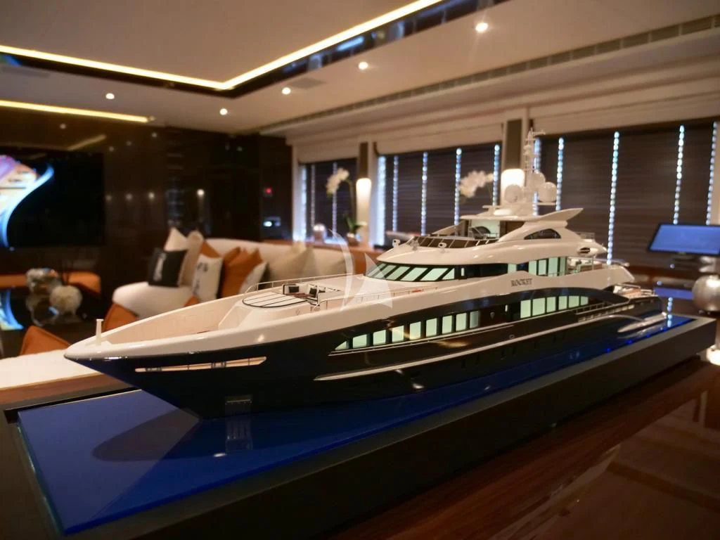 a large yacht in a room aboard ROCKET Yacht for Sale