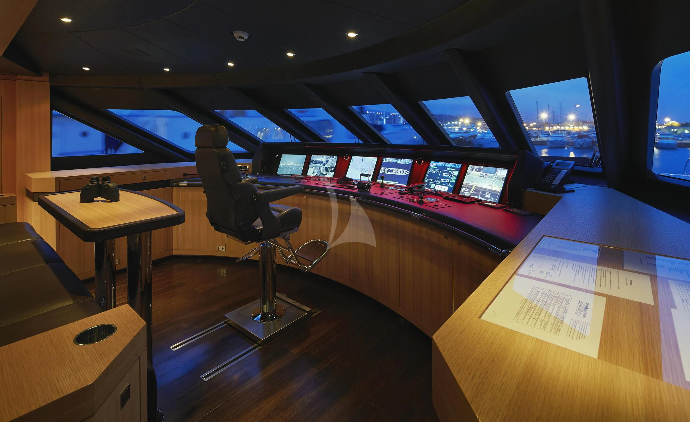 a room with desks and chairs aboard ROCKET Yacht for Sale