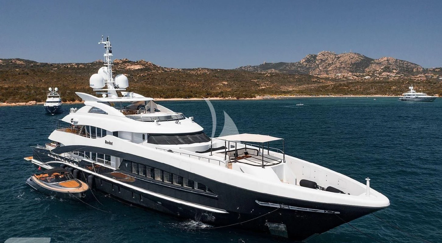 a large white yacht in the water aboard ROCKET Yacht for Sale