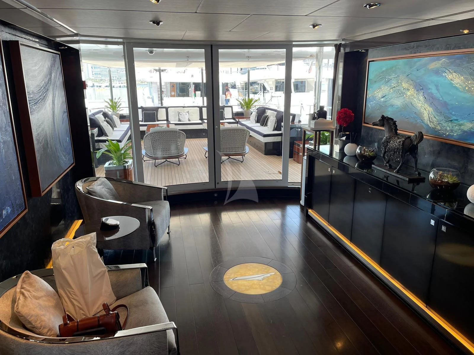 a room with a large glass window aboard ROCKET Yacht for Sale