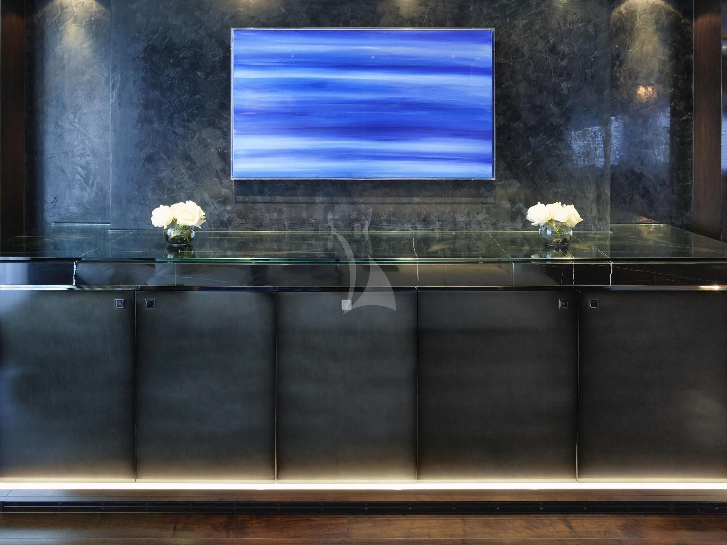 a tv on a wall aboard ROCKET Yacht for Sale