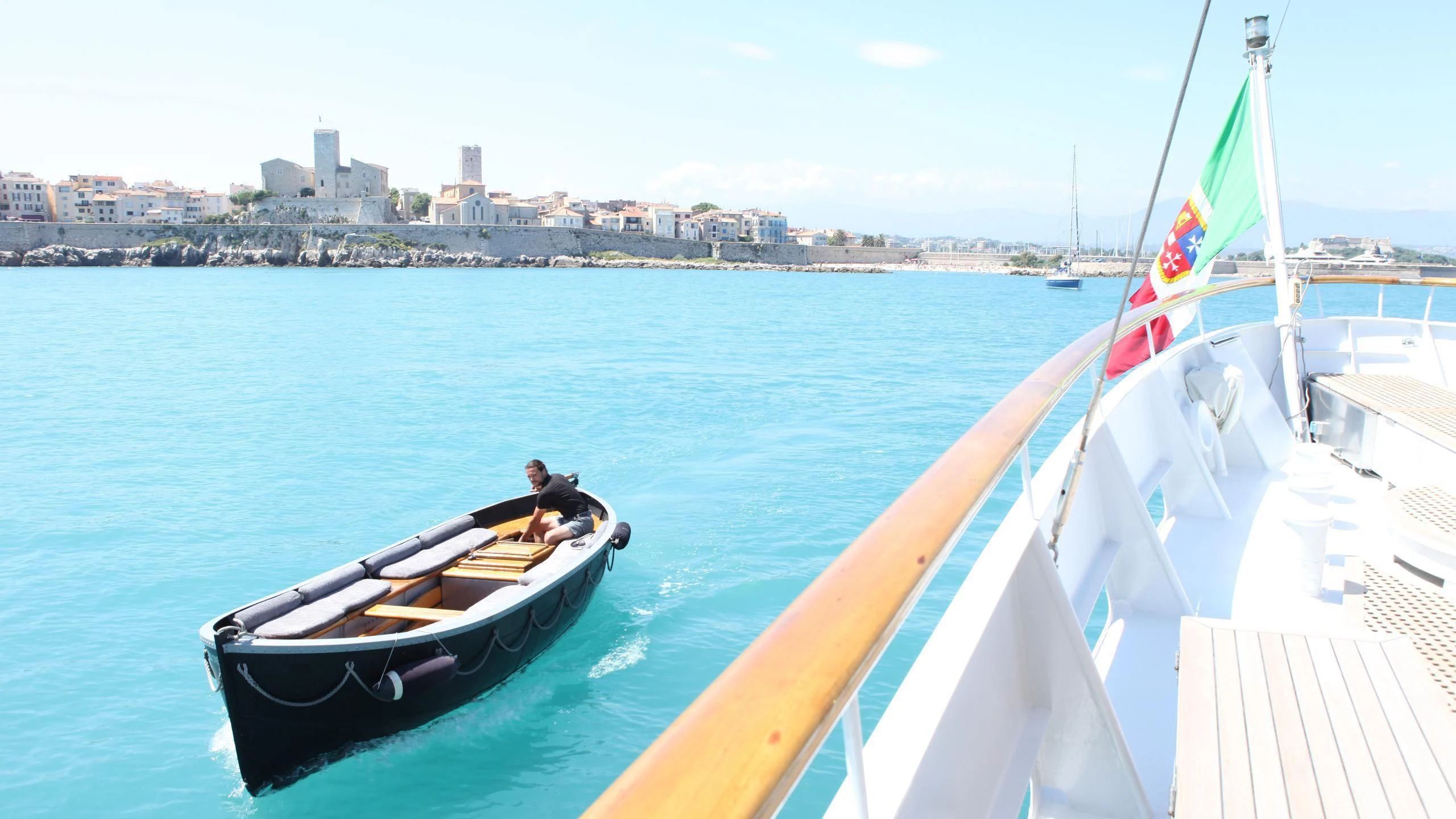 a boat with a person on it aboard DIONEA Yacht for Sale