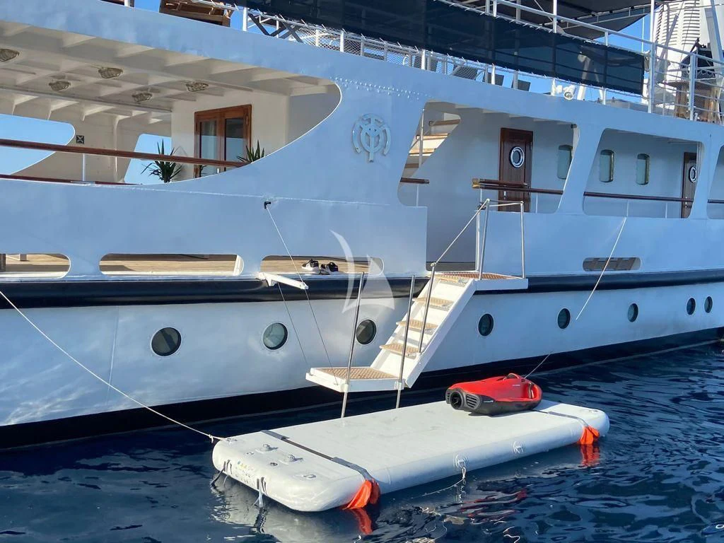 a couple of boats are parked in a harbor aboard DIONEA Yacht for Sale