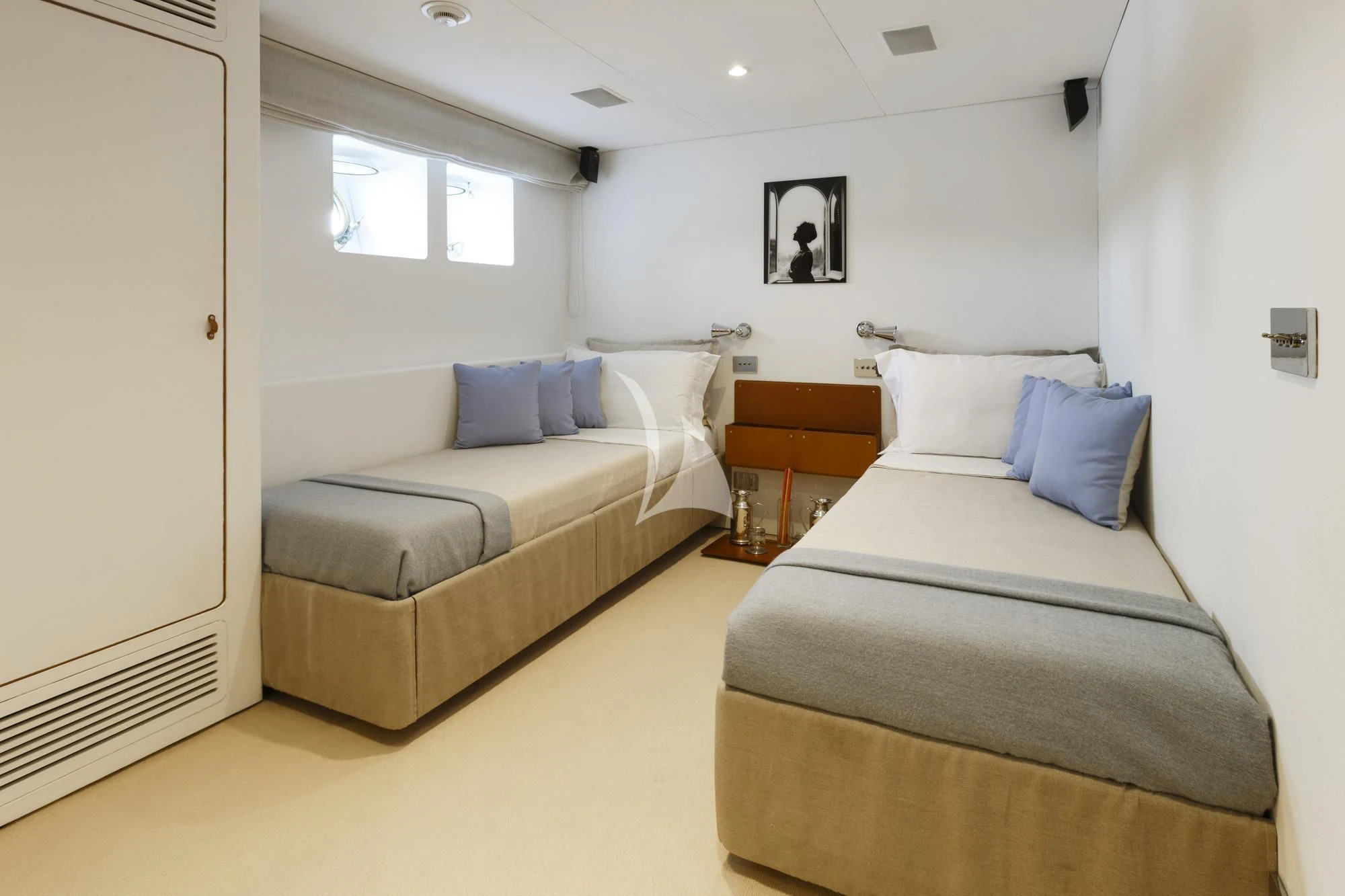 a room with two beds aboard DIONEA Yacht for Sale