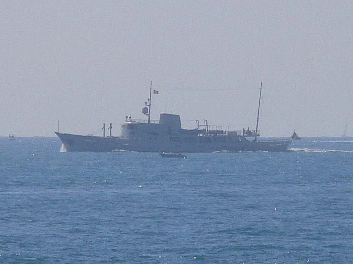 a large ship in the water aboard DIONEA Yacht for Sale