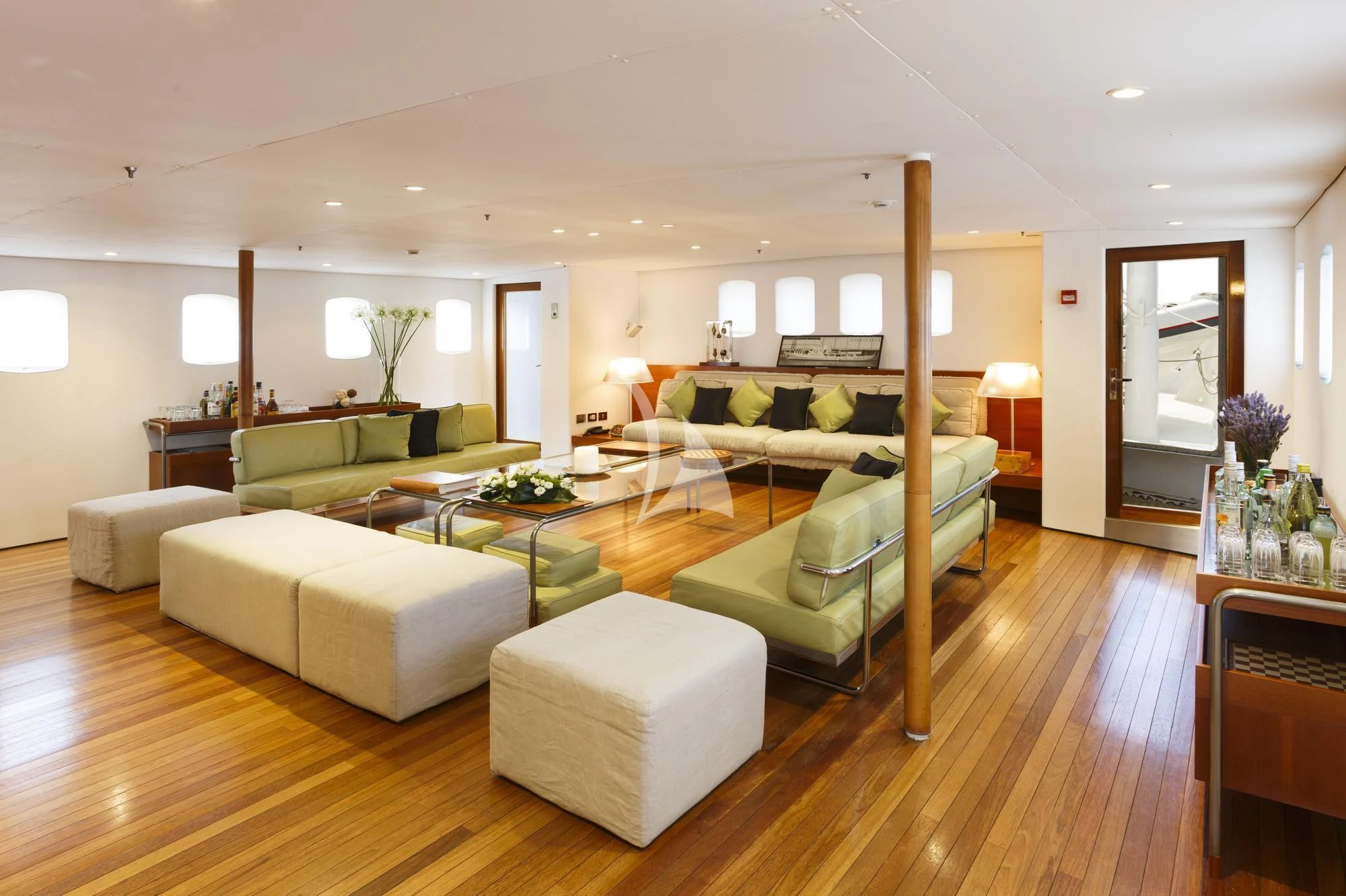 a living room with a large wood frame and a wood frame aboard DIONEA Yacht for Sale