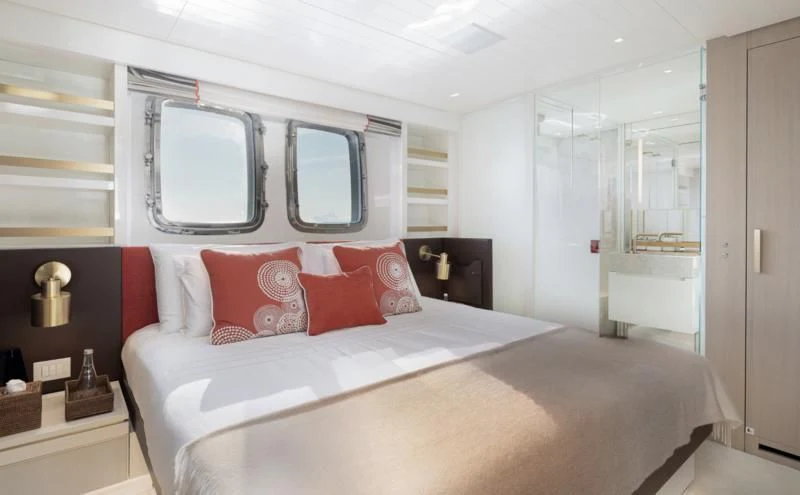 a bed in a room aboard ELA & SEA Yacht for Sale