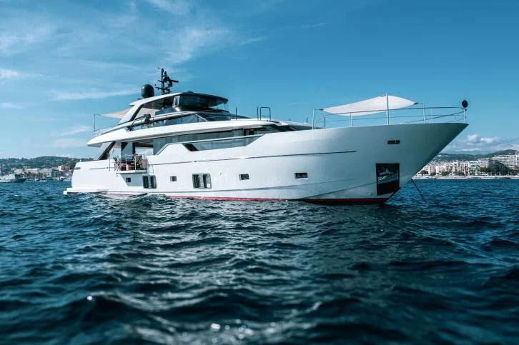 a large white boat in the water aboard ELA & SEA Yacht for Sale