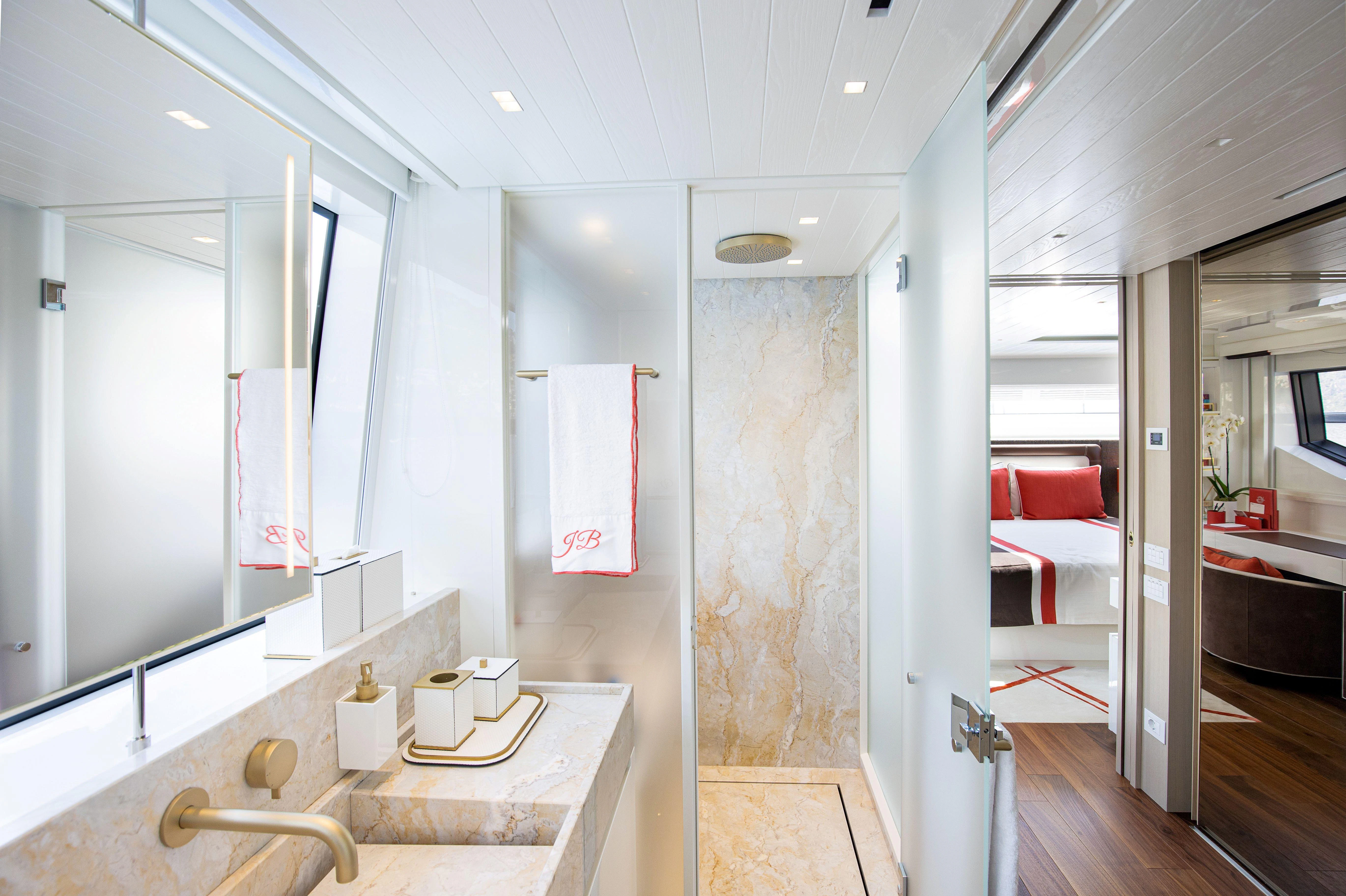 a bathroom with a sink and a mirror aboard ELA & SEA Yacht for Sale