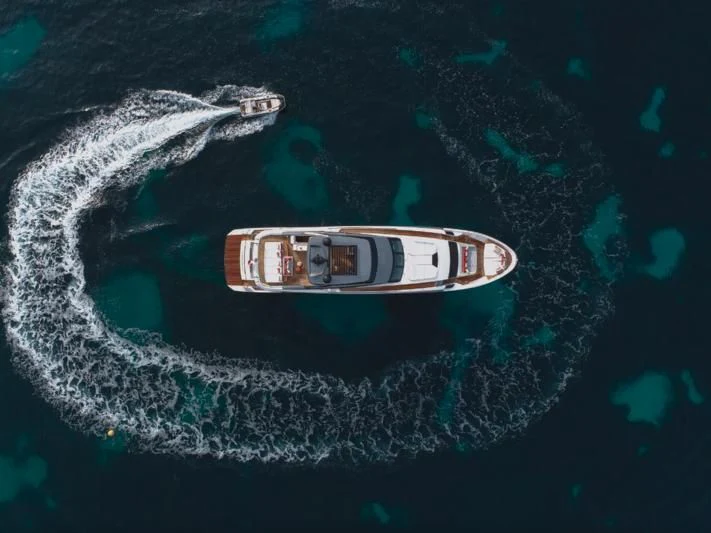 a guitar on a rock aboard ELA & SEA Yacht for Sale