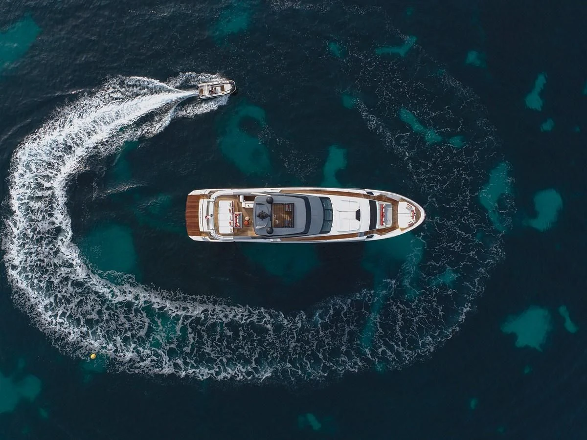 a guitar floating in the water aboard ELA & SEA Yacht for Sale