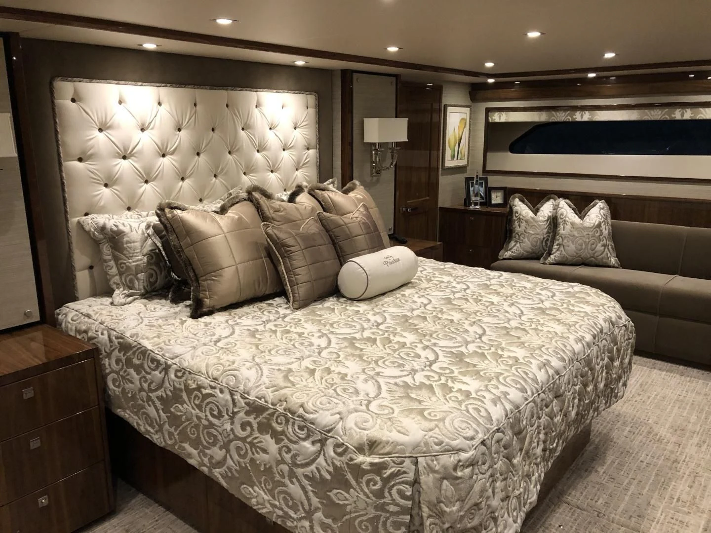 a large bed in a hotel room aboard AFTER MIDNIGHT Yacht for Sale