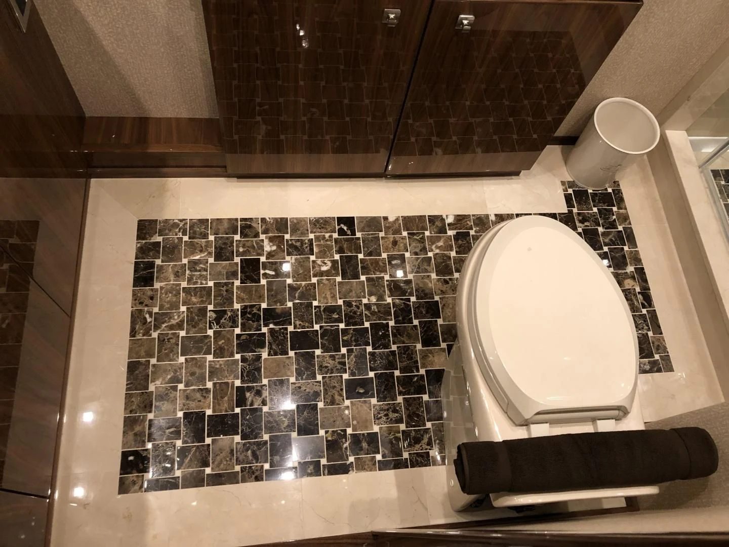 a toilet in a bathroom aboard AFTER MIDNIGHT Yacht for Sale