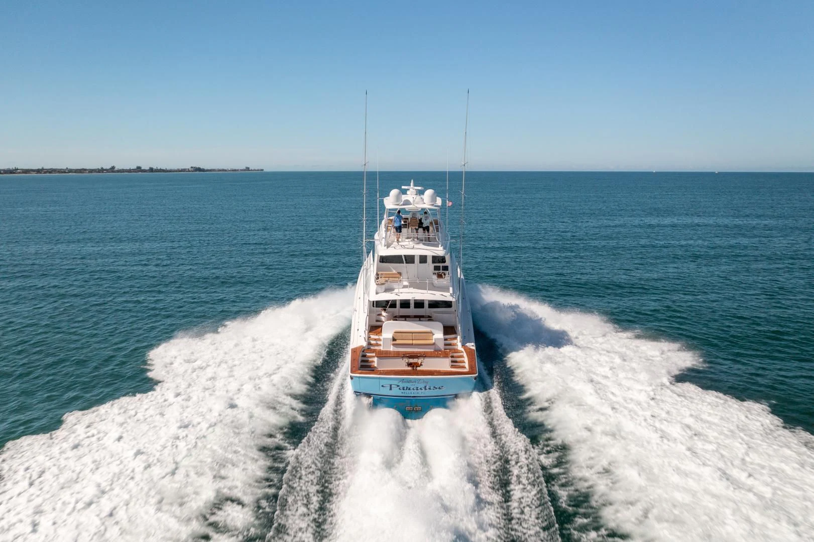 a ship on the water aboard AFTER MIDNIGHT Yacht for Sale
