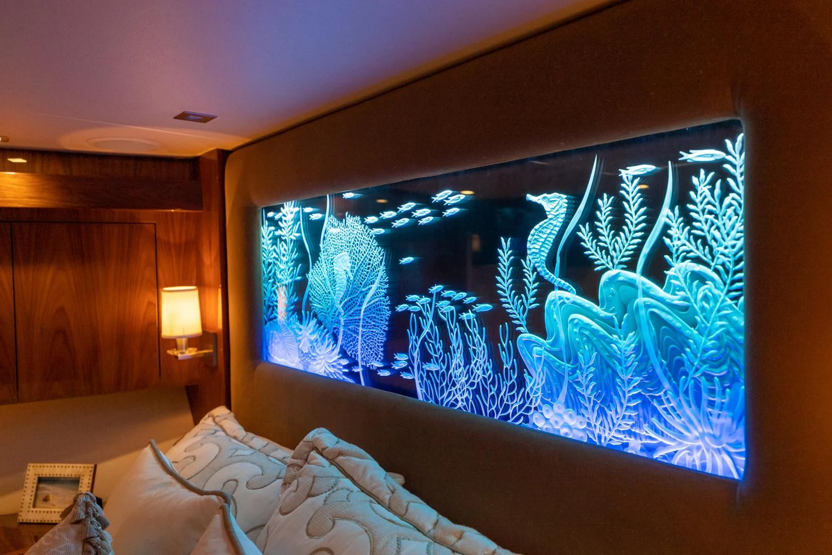 a large aquarium in a room aboard AFTER MIDNIGHT Yacht for Sale