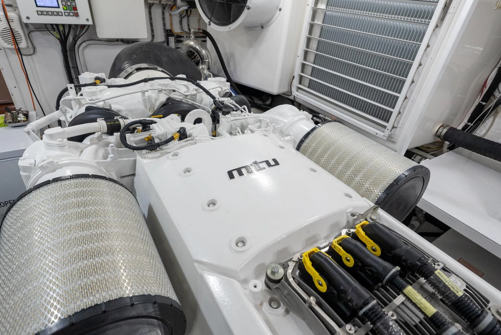 the engine of a car aboard AFTER MIDNIGHT Yacht for Sale
