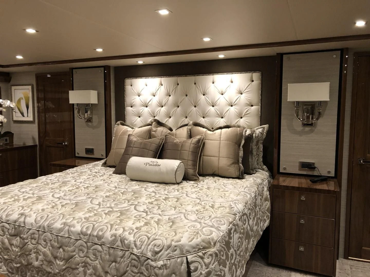 a large bed in a hotel room aboard AFTER MIDNIGHT Yacht for Sale