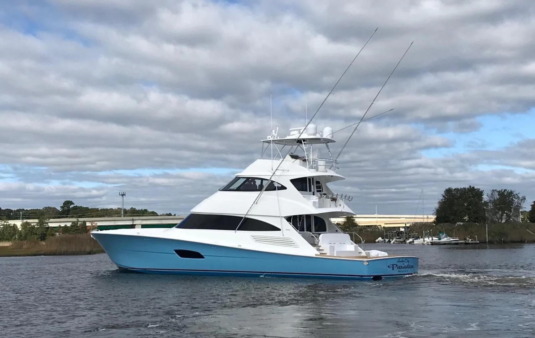 a boat on the water aboard AFTER MIDNIGHT Yacht for Sale