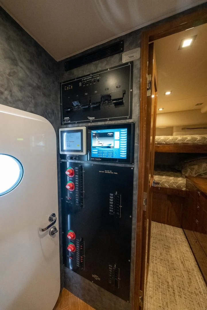a machine with buttons and screens aboard AFTER MIDNIGHT Yacht for Sale