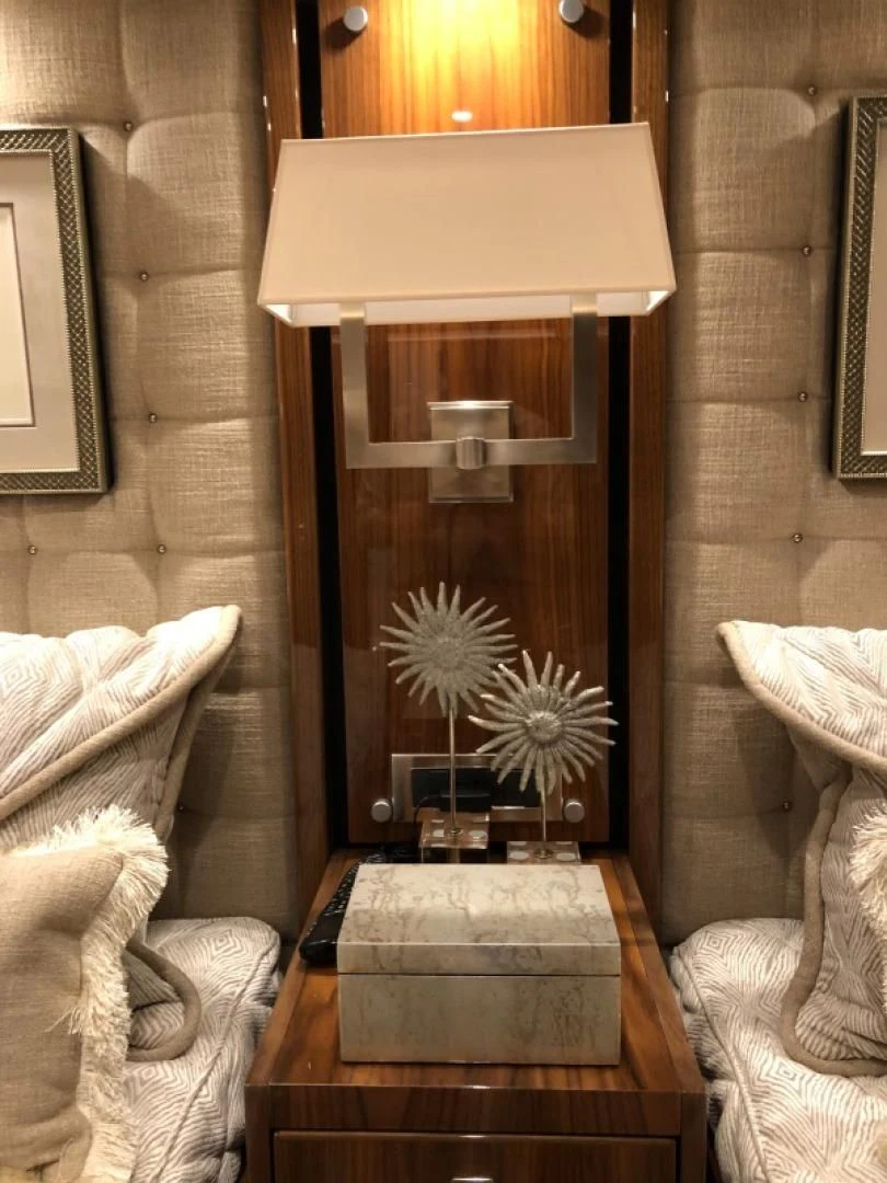a wood door with a lamp on it aboard AFTER MIDNIGHT Yacht for Sale