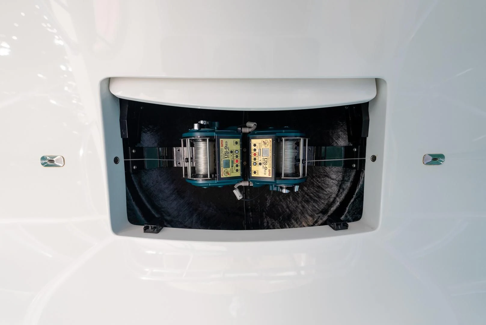 a black and blue electrical device aboard AFTER MIDNIGHT Yacht for Sale
