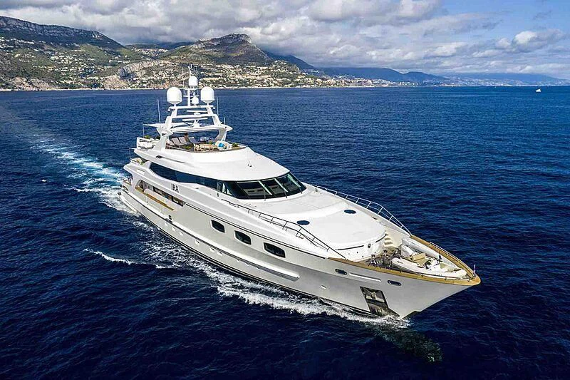 a white yacht on the water aboard TIAMAT Yacht for Sale