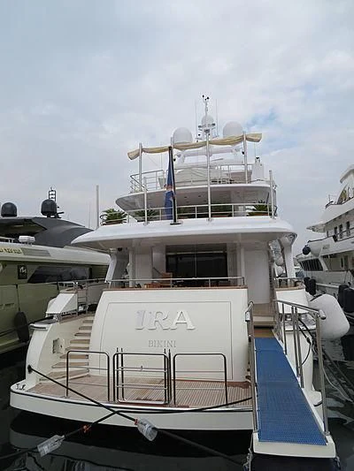 a boat with a crane on the deck aboard TIAMAT Yacht for Sale