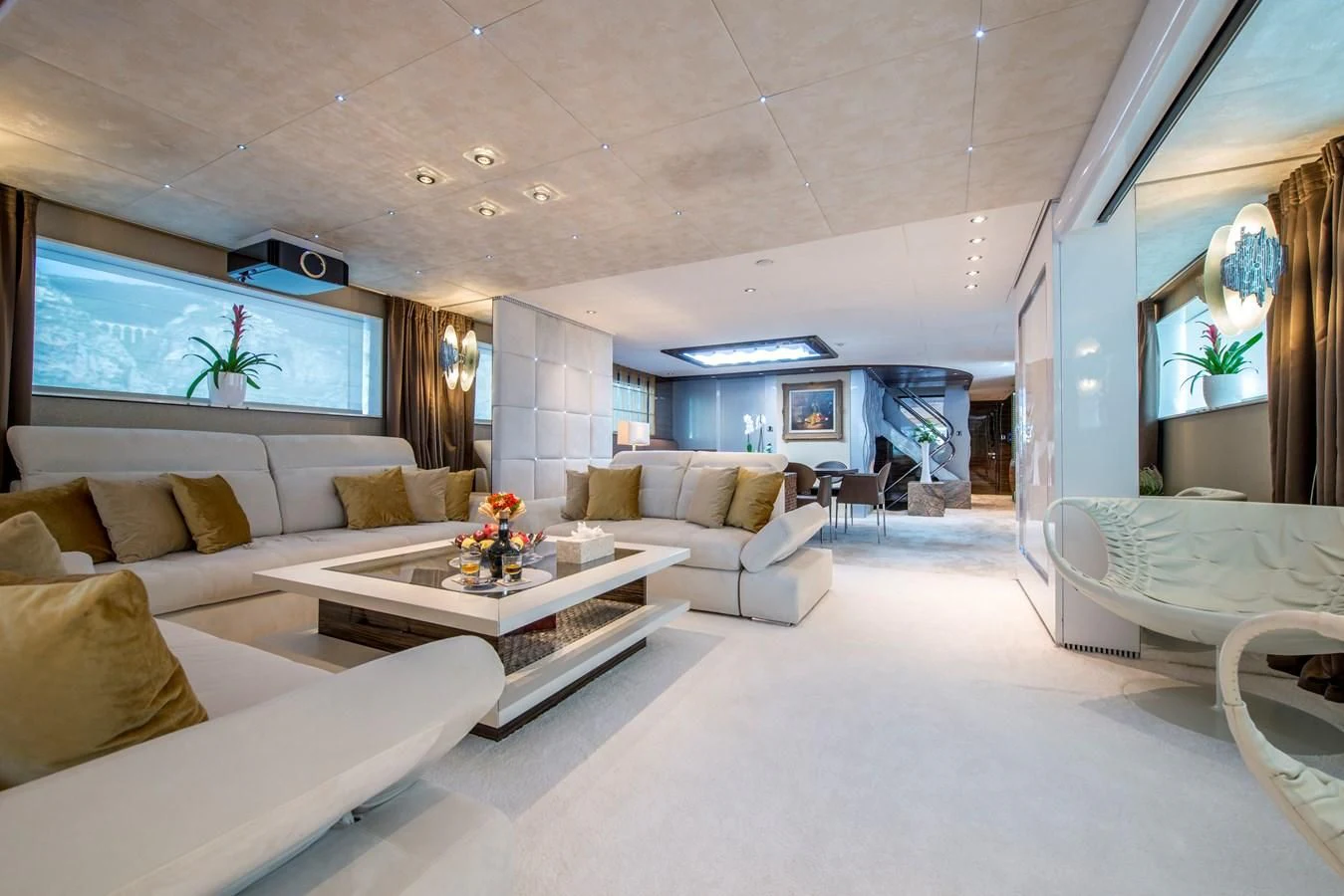 a living room with a large window aboard TIAMAT Yacht for Sale