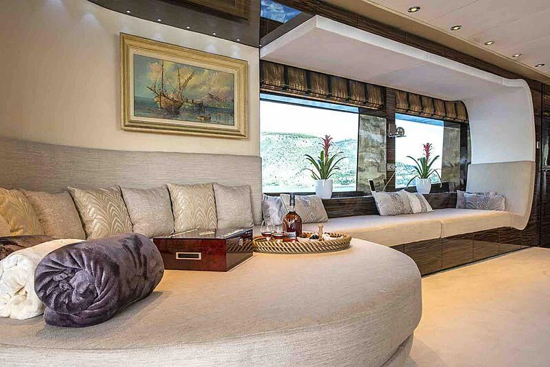 a living room with a large window aboard TIAMAT Yacht for Sale