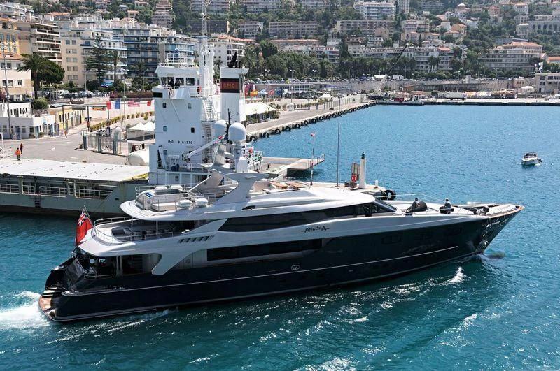 a large ship in the water aboard TIAMAT Yacht for Sale