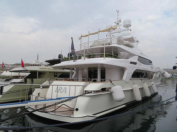 a boat docked at a pier aboard TIAMAT Yacht for Sale