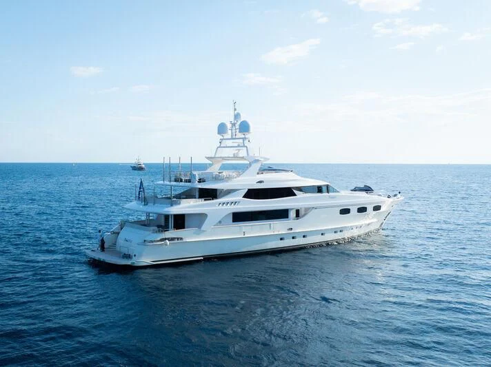 a white yacht in the water aboard TIAMAT Yacht for Sale