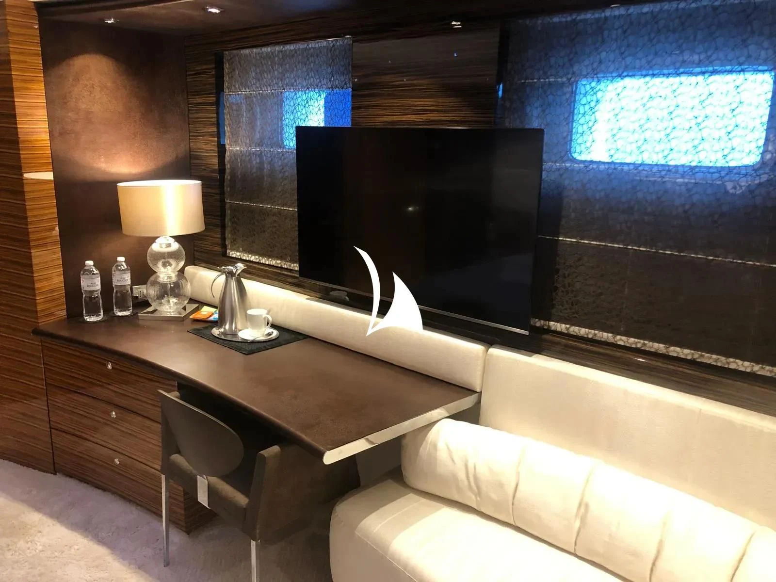a room with a large tv aboard TIAMAT Yacht for Sale