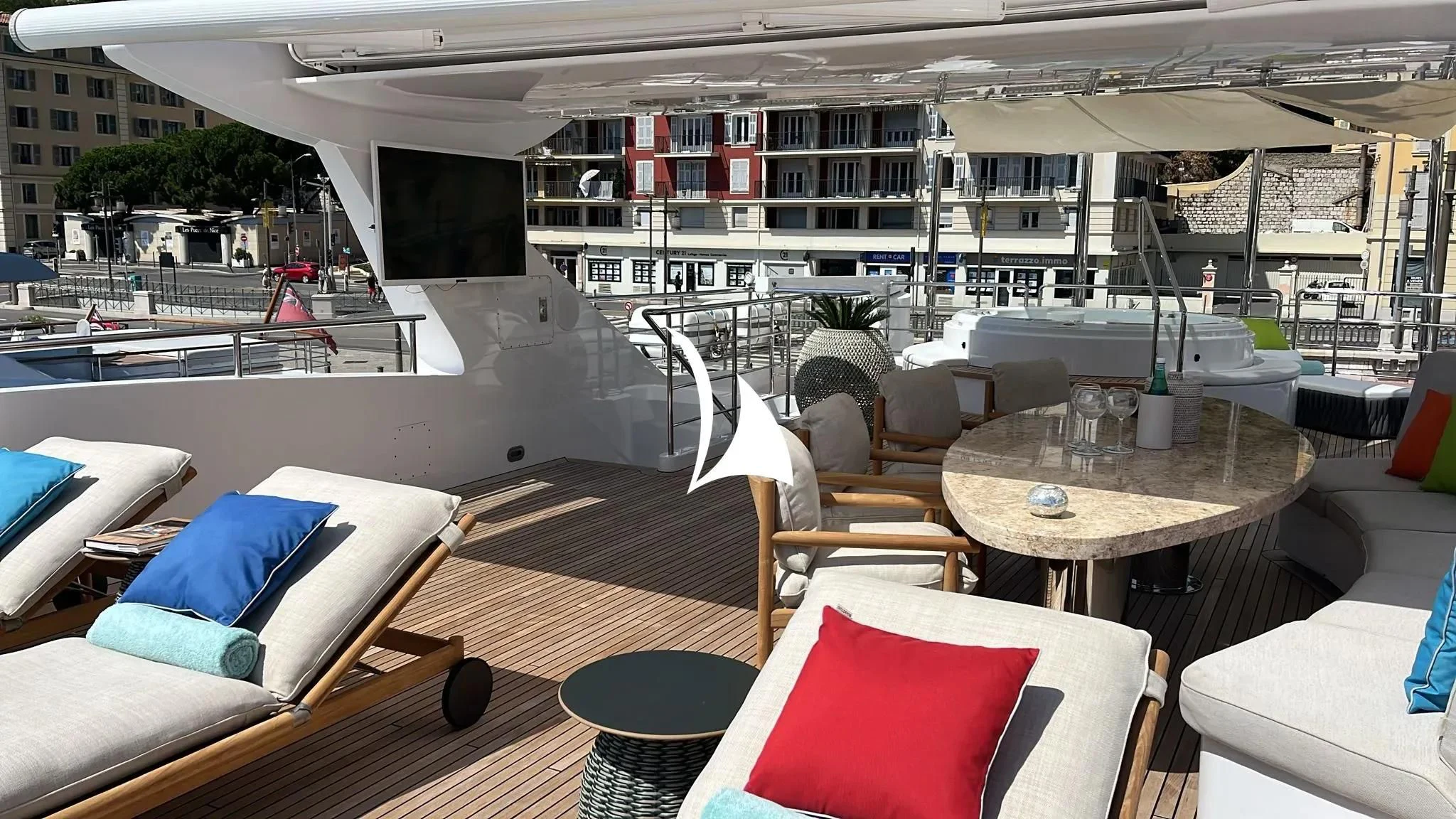 a boat with a table and chairs aboard TIAMAT Yacht for Sale