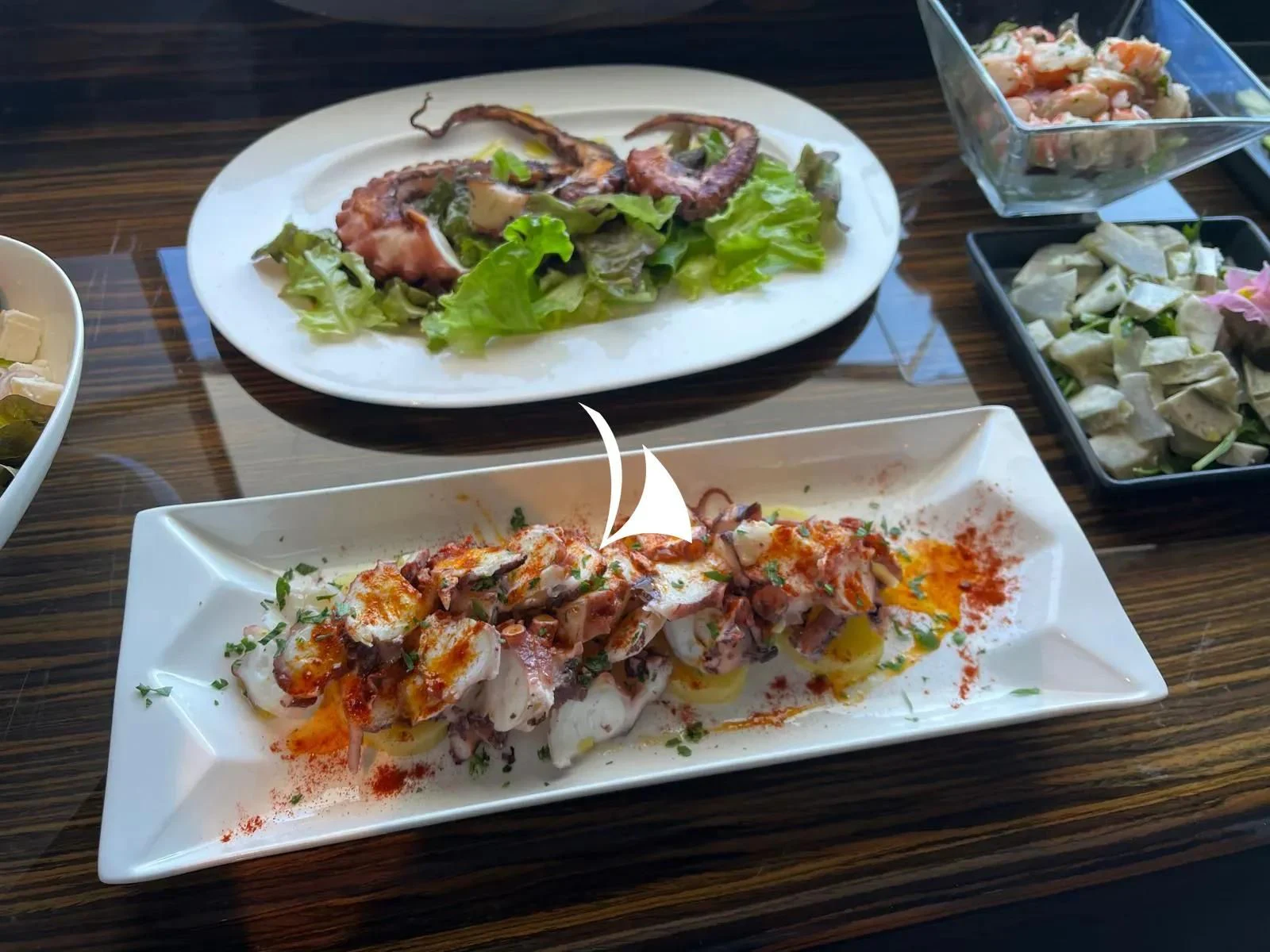 a couple of plates of food aboard TIAMAT Yacht for Sale