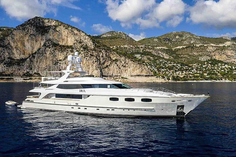 a white yacht in the water aboard TIAMAT Yacht for Sale