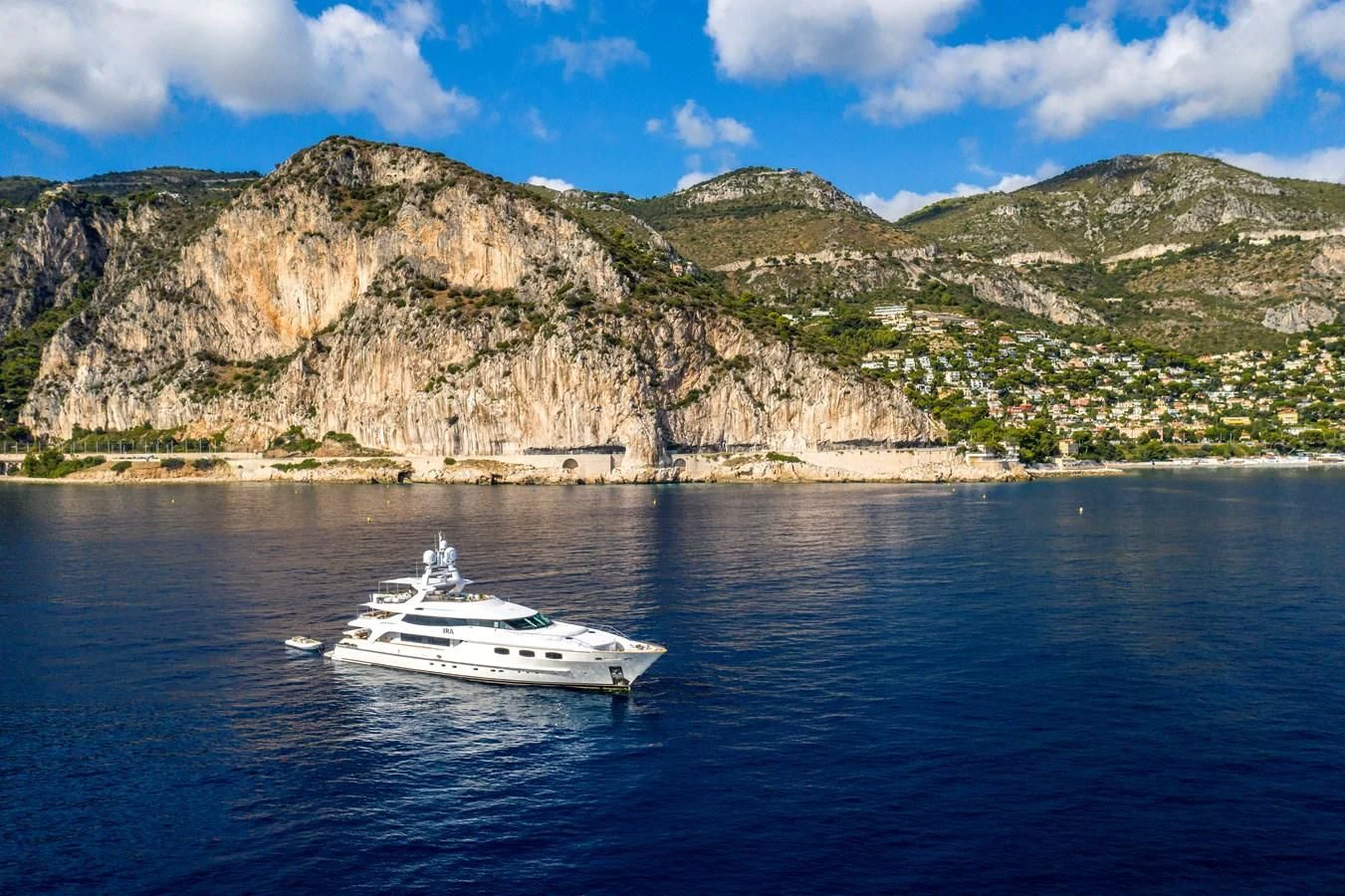 a boat sailing on the water aboard TIAMAT Yacht for Sale