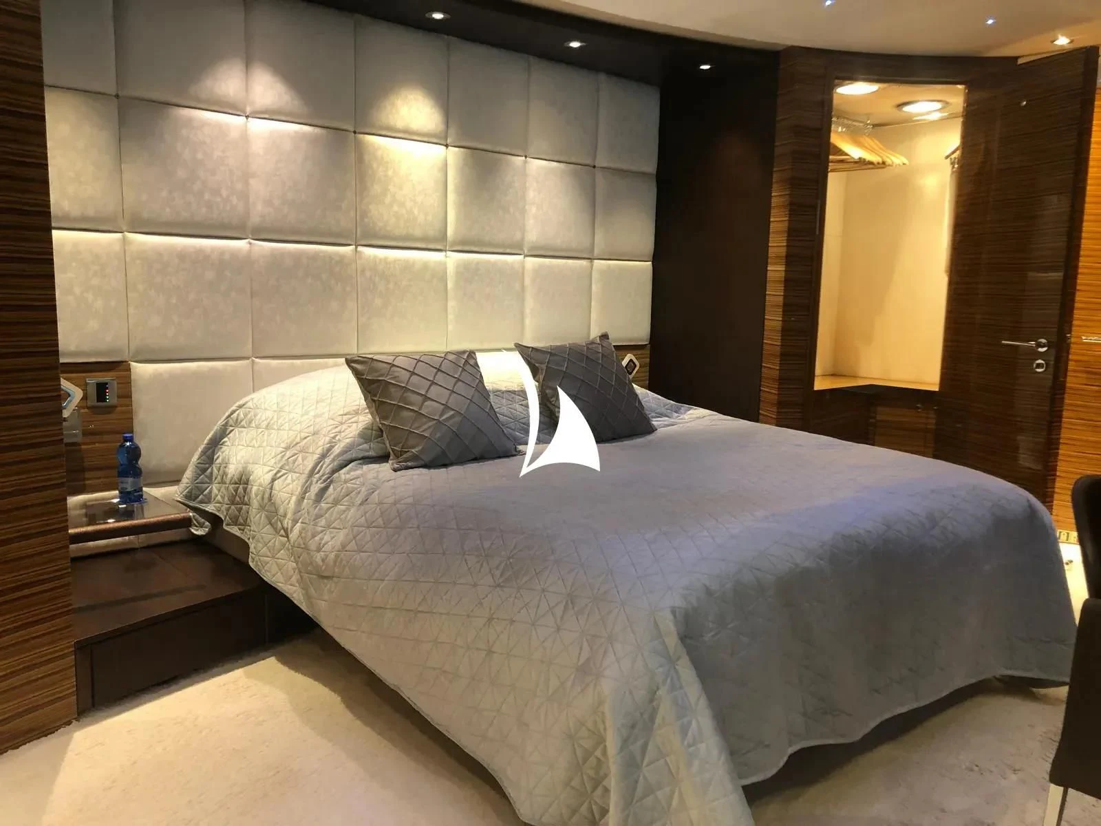a bed in a room aboard TIAMAT Yacht for Sale