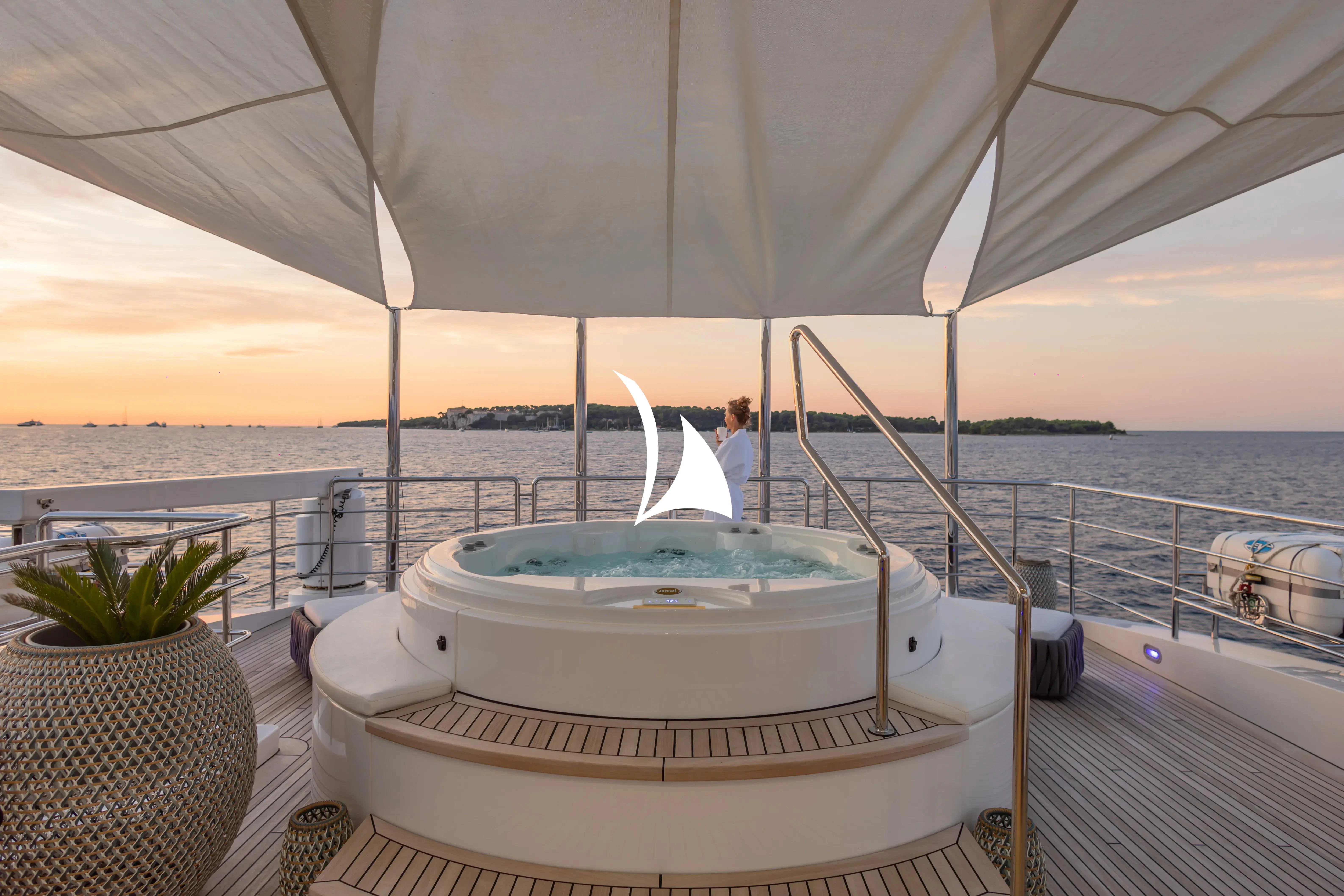 a boat on the water aboard TIAMAT Yacht for Sale