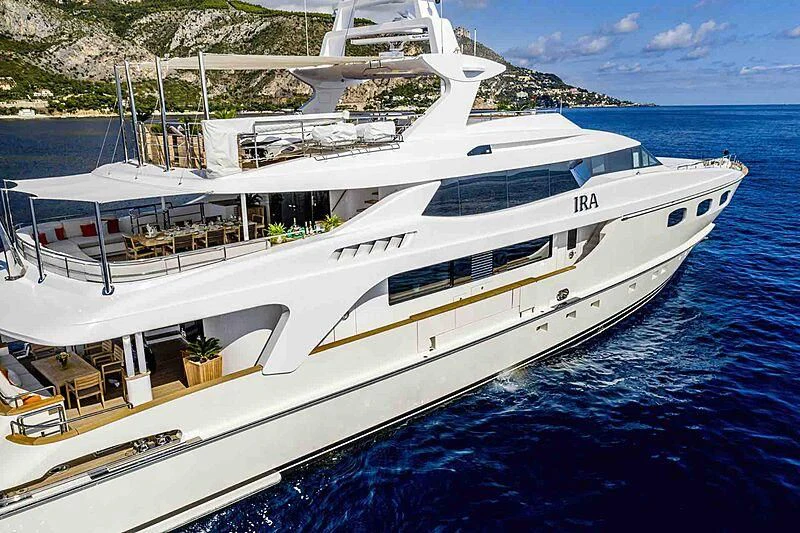 a white yacht in the water aboard TIAMAT Yacht for Sale