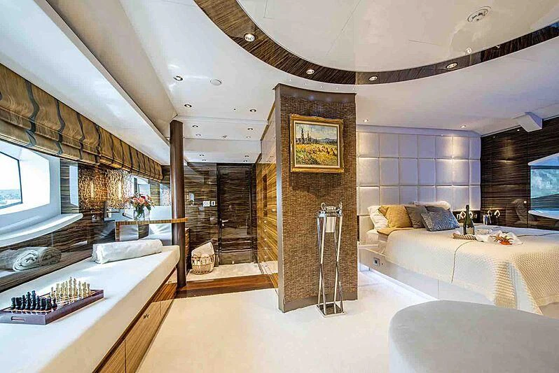 a large bedroom with a large open window aboard TIAMAT Yacht for Sale