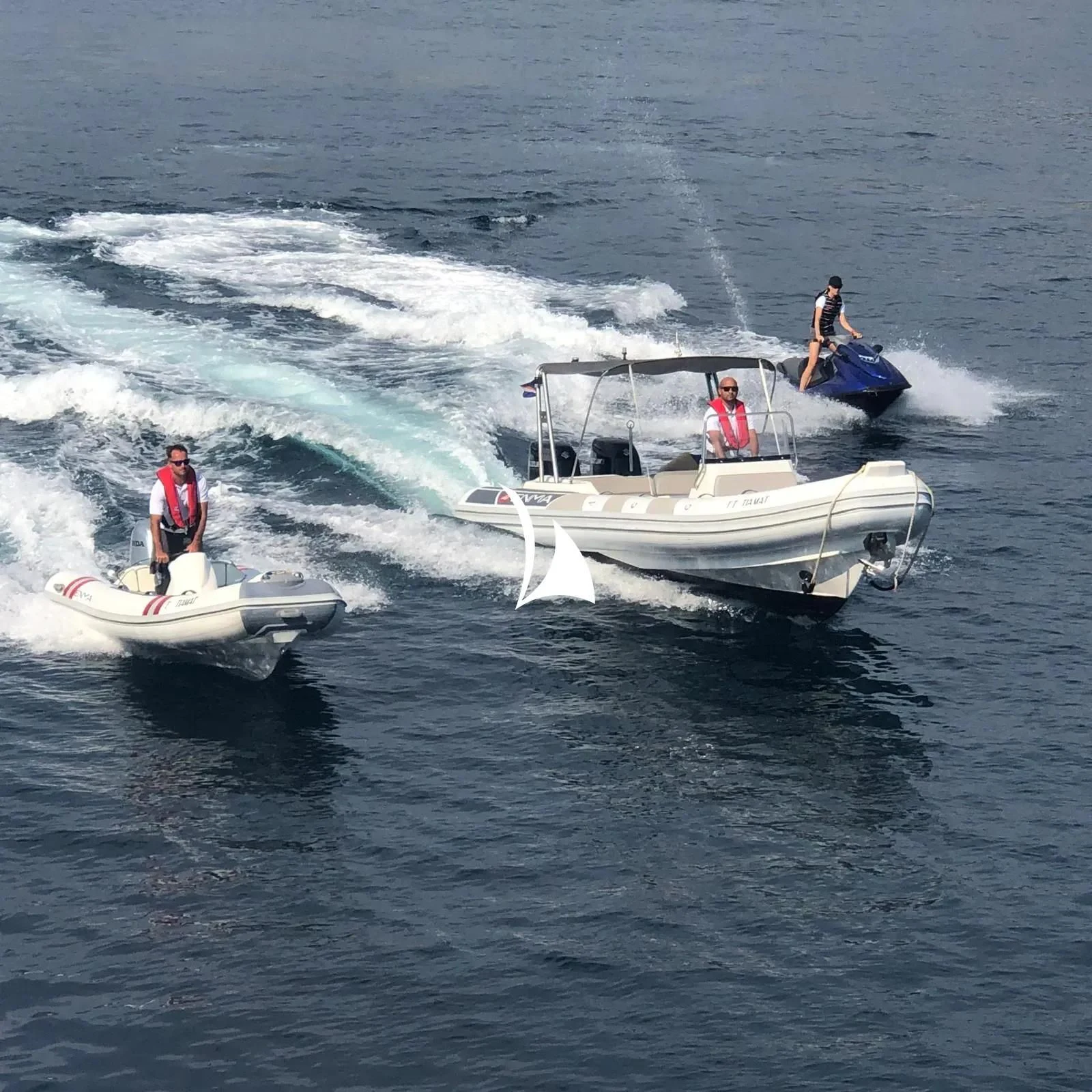 a group of people on a boat aboard TIAMAT Yacht for Sale