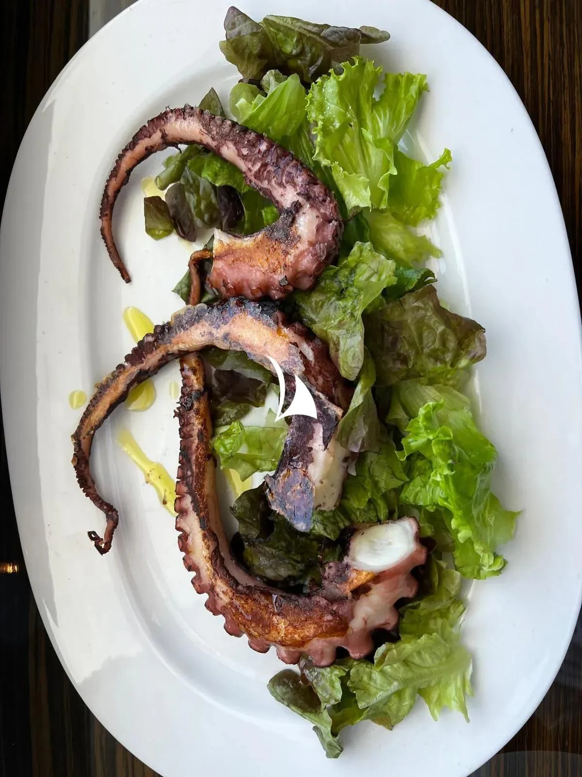 a plate of food aboard TIAMAT Yacht for Sale