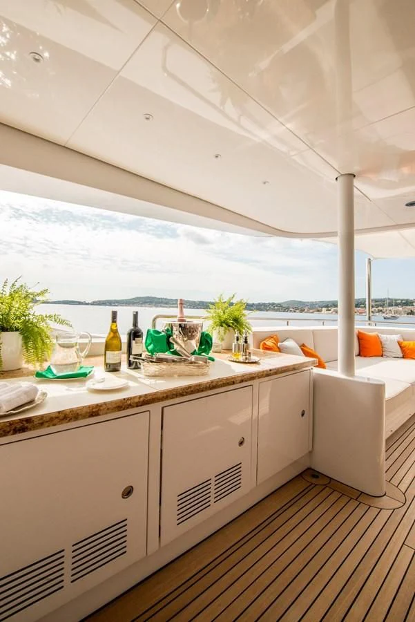 a kitchen with a view of the ocean aboard TIAMAT Yacht for Sale