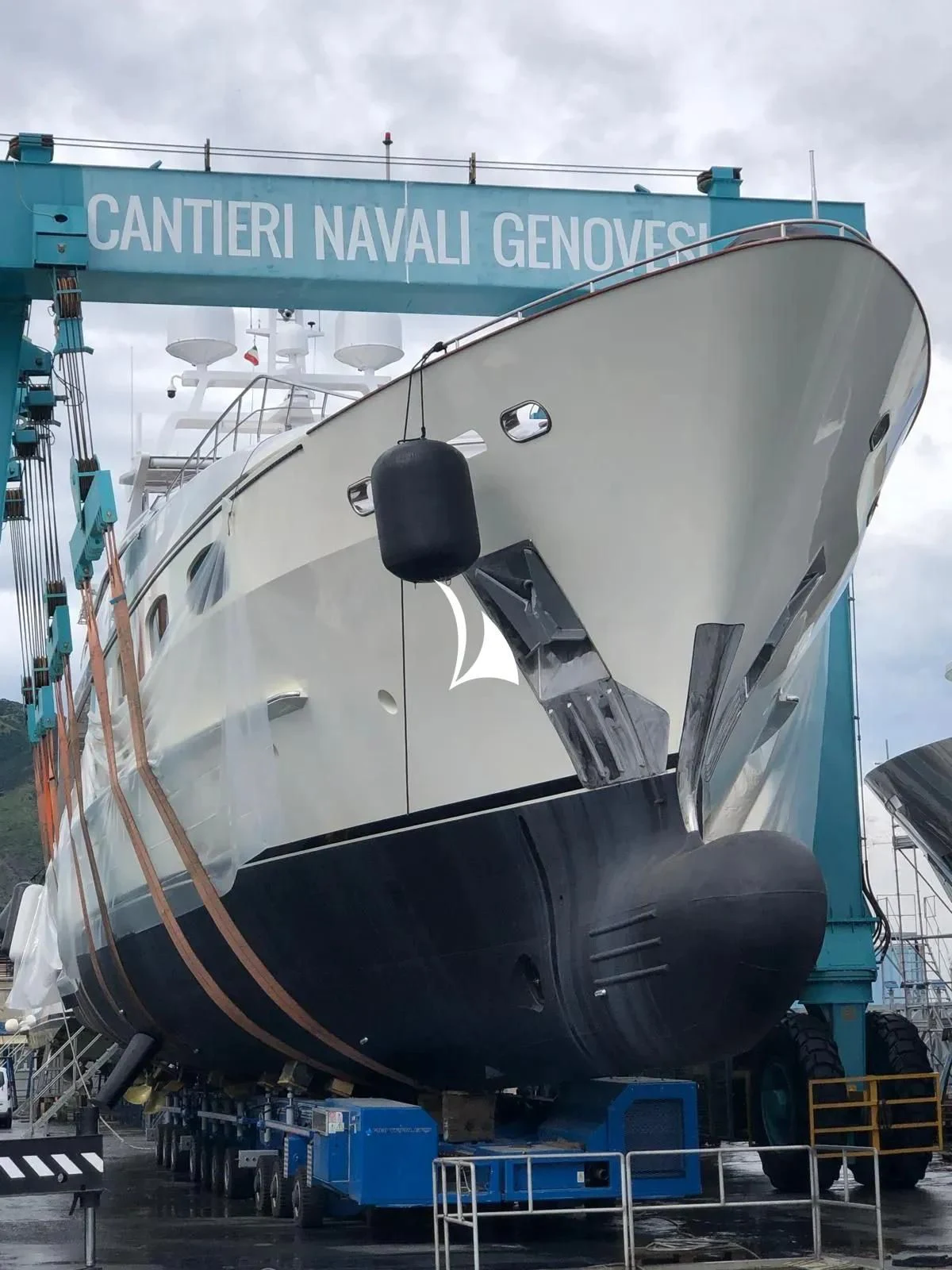 a large black airplane aboard TIAMAT Yacht for Sale