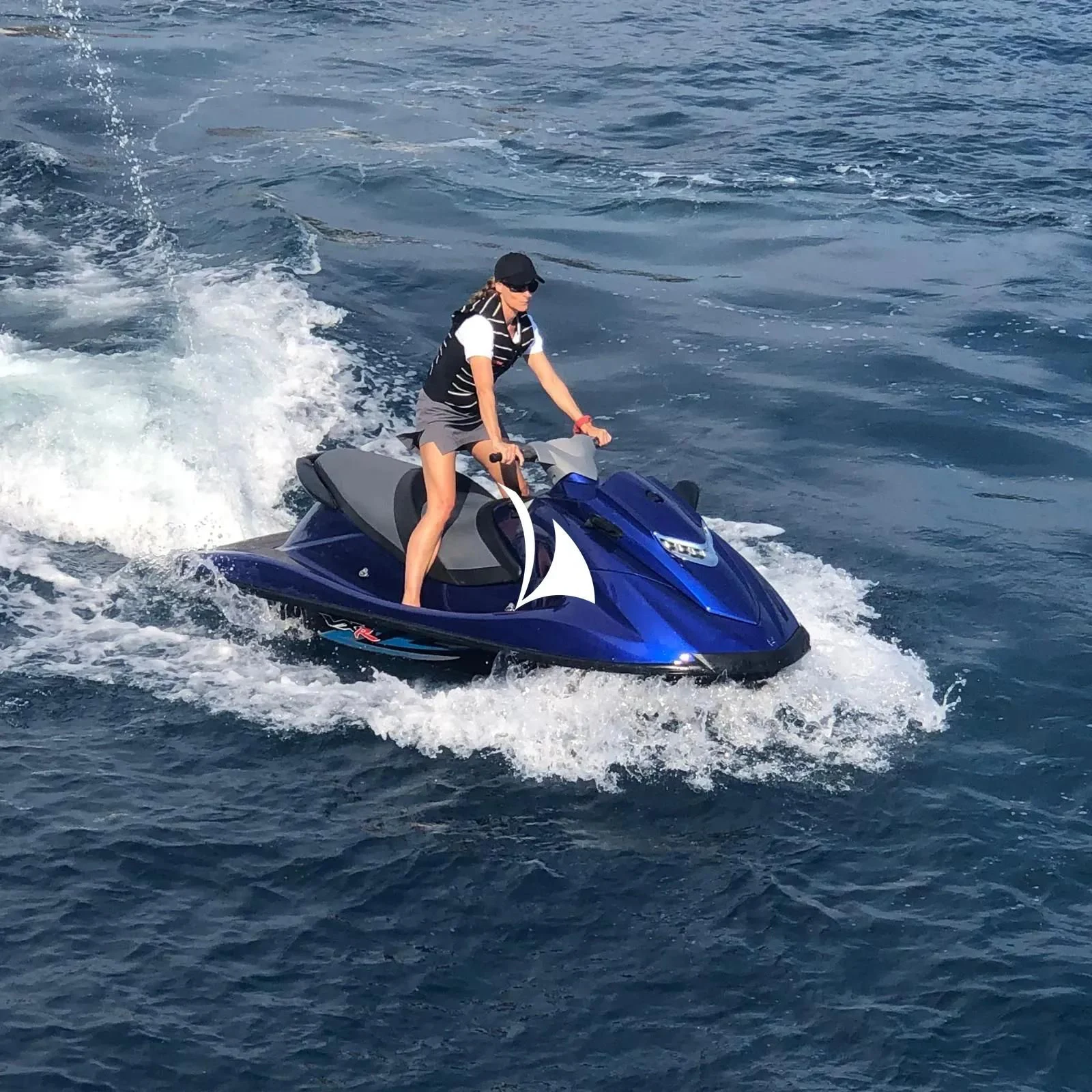 a man on a jet ski aboard TIAMAT Yacht for Sale
