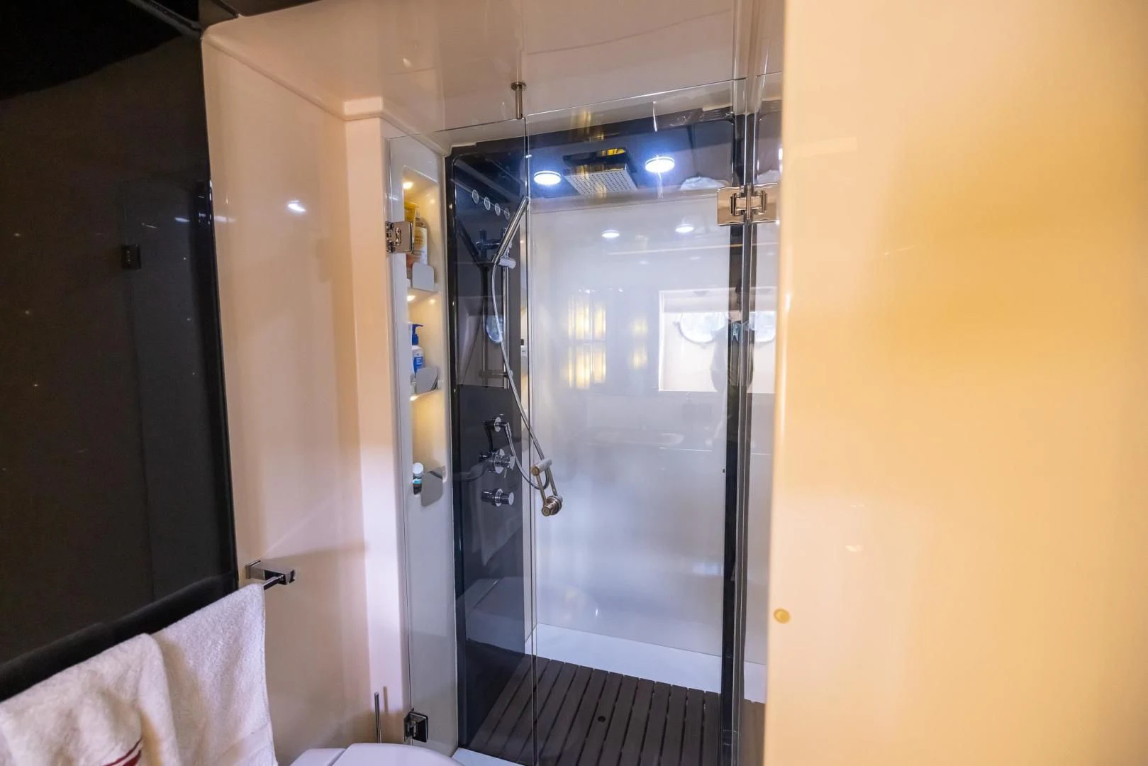 a bathroom with a glass shower aboard MEANT TO BE Yacht for Sale
