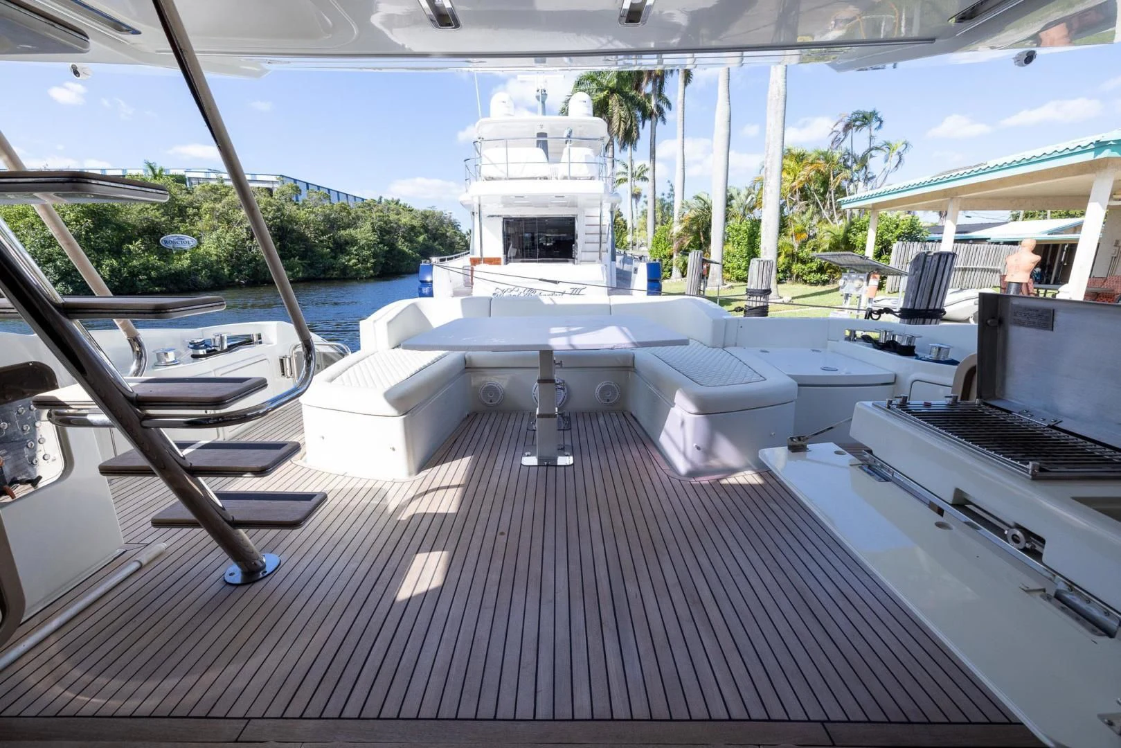 a deck with a deck and chairs aboard MEANT TO BE Yacht for Sale