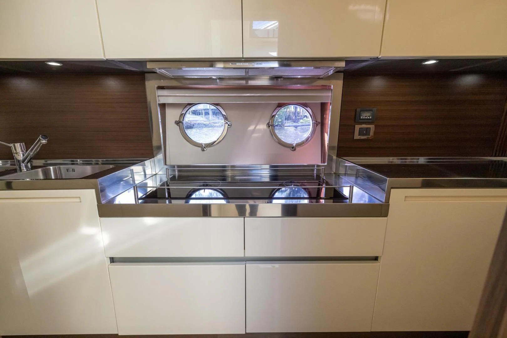 a kitchen with a stove and a sink aboard MEANT TO BE Yacht for Sale